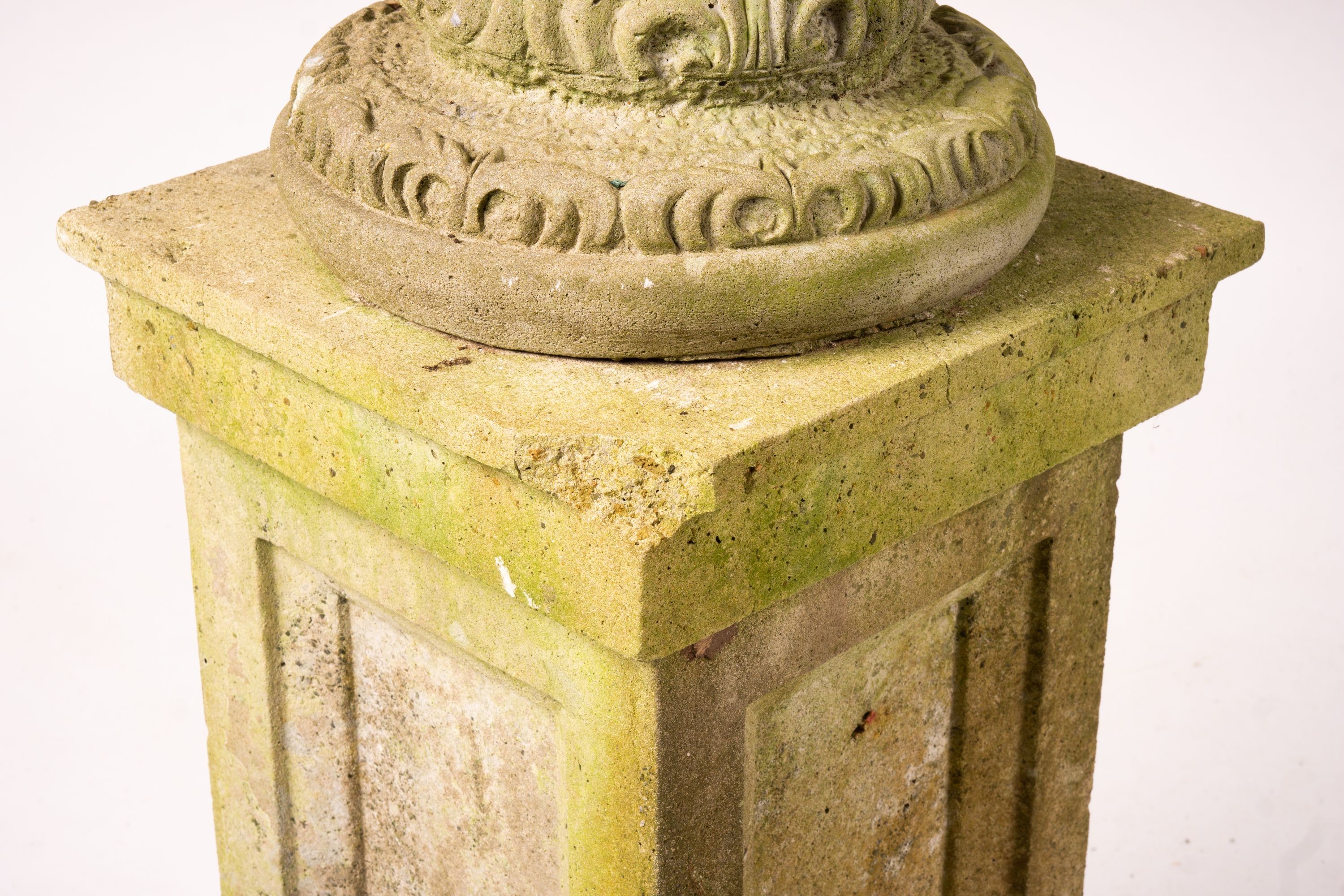 A pair of reconstituted stone circular garden planters on pedestal bases, diameter 45cm, height 110cm